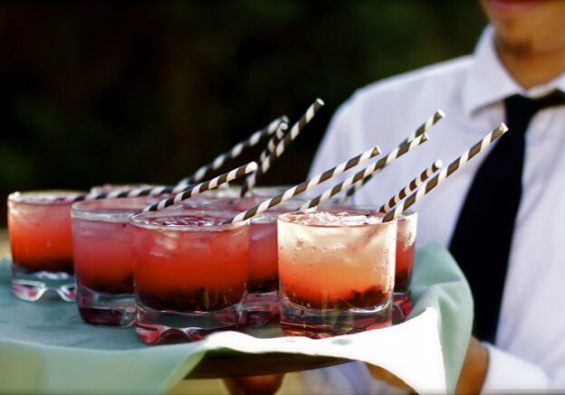 Red cocktails and paper straws | Kelly Chandler Consulting